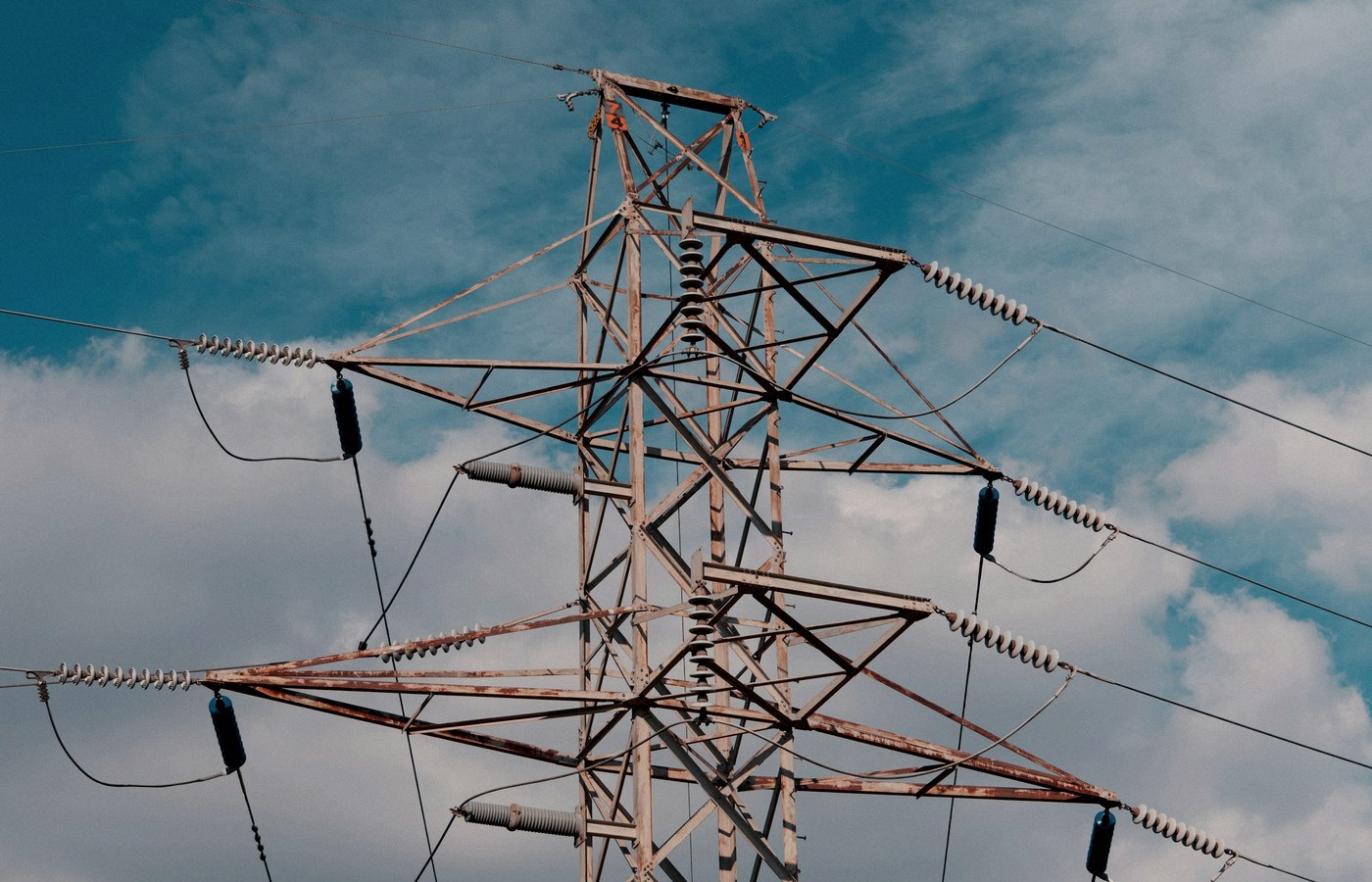 Face-free high-voltage transmission tower for AI Energy Management Alliance — electrical infrastructure, Sep 16 2026