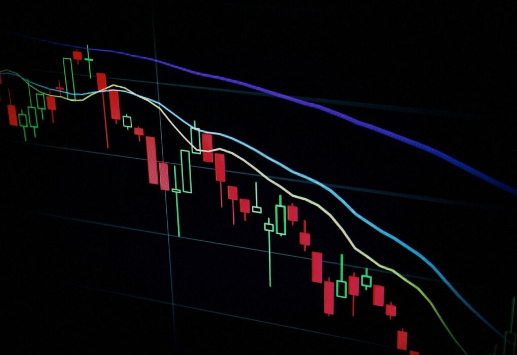 Face-free Unsplash candlestick chart on a dark screen — markets / IPO metaphor hero still for Anthropic mega IPO and Nvidia anchor talks September 2026