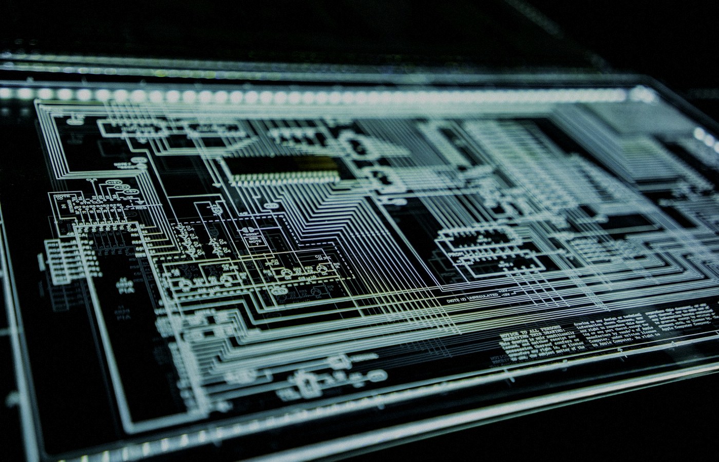 Face-free abstract teal LED circuit panel glowing against a dark background — related cybersecurity and agent supply-chain infrastructure still for AIR AI security startup coverage