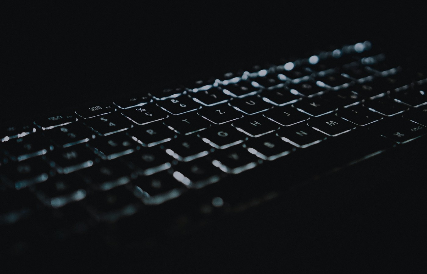 Face-free dark keyboard glow for Cursor Rollouts and Security Review
