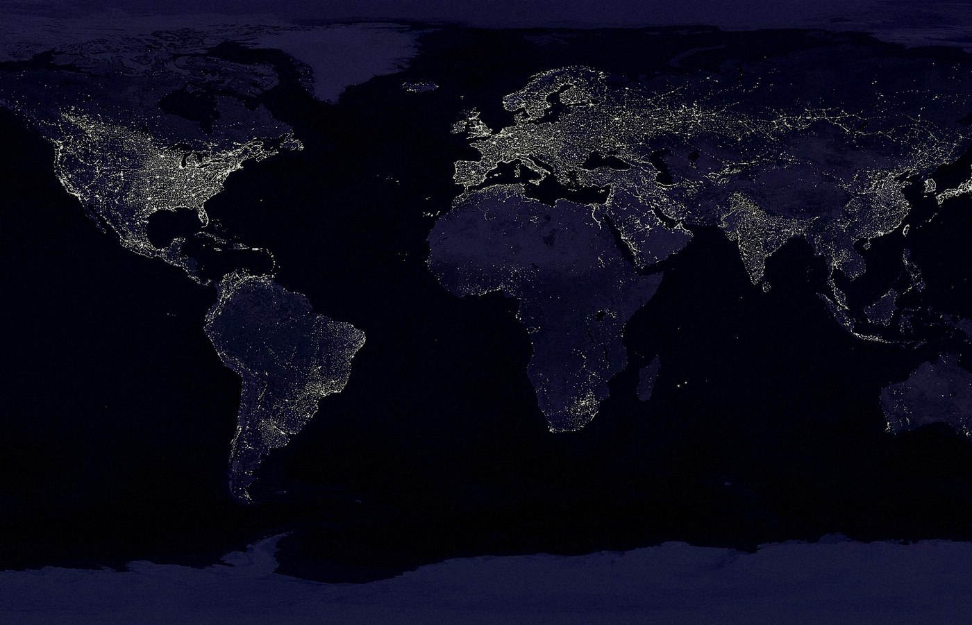 Face-free public-domain NASA Earth city-lights composite at night — global network / internet metaphor hero still for Amodei pace-the-frontier essay September 2026