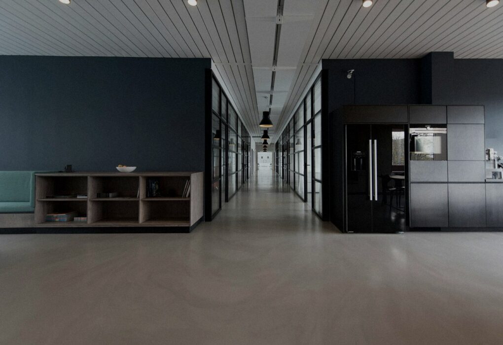 Face-free Unsplash photograph of an empty modern office hallway / open workspace — related still for Jack & Jill Series A hiring-agents news Sep 15 2026