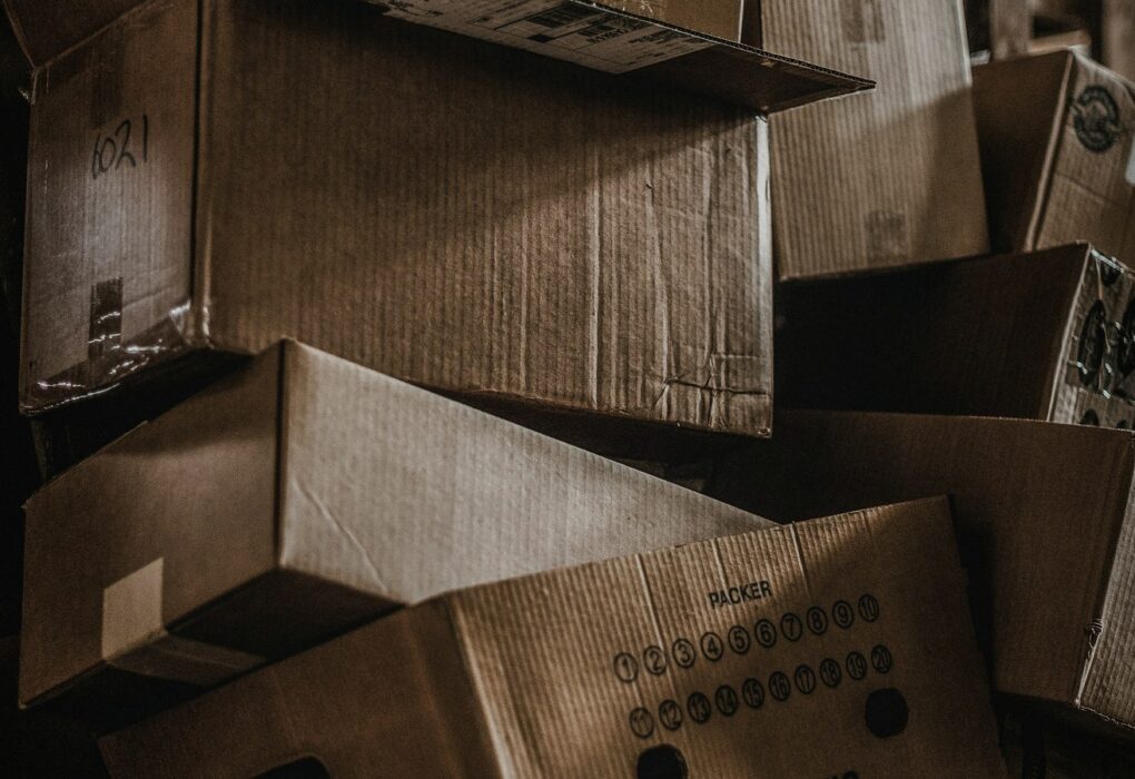 Face-free cardboard-box logistics inventory still for Magentic industrial procurement digital workers, Sep 17 2026