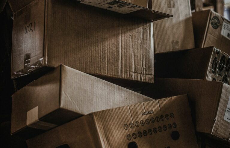Face-free cardboard-box logistics inventory still for Magentic industrial procurement digital workers, Sep 17 2026
