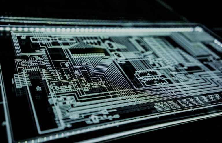 Face-free Unsplash teal LED panel / circuit glow — cybersecurity infrastructure hero still for PaperCut NG/MF AI-orchestrated campaign September 2026